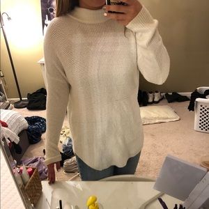 White turtleneck sweater